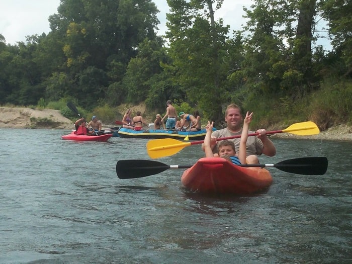 family kayaking with Morgan's Canoe