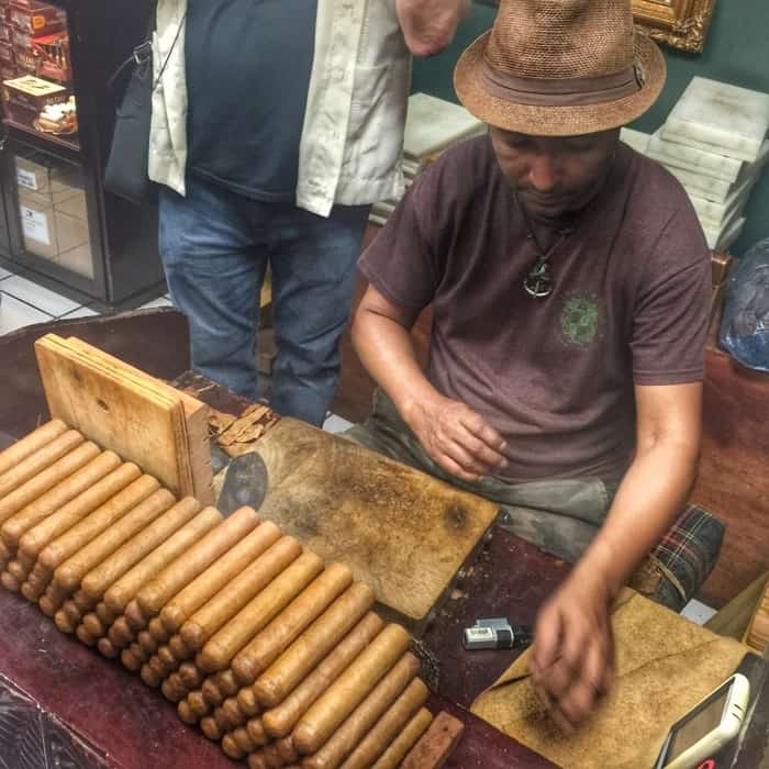 Man making cigars at Cuba Tobacco Cigar Factory in Little Havana
