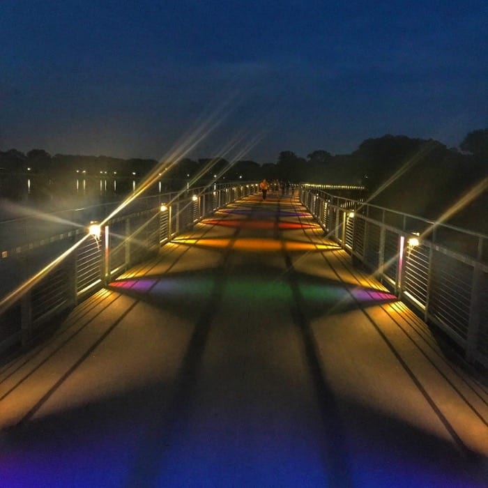 colorful bridge at Gray's Lake at Night in Des Moines Iowa