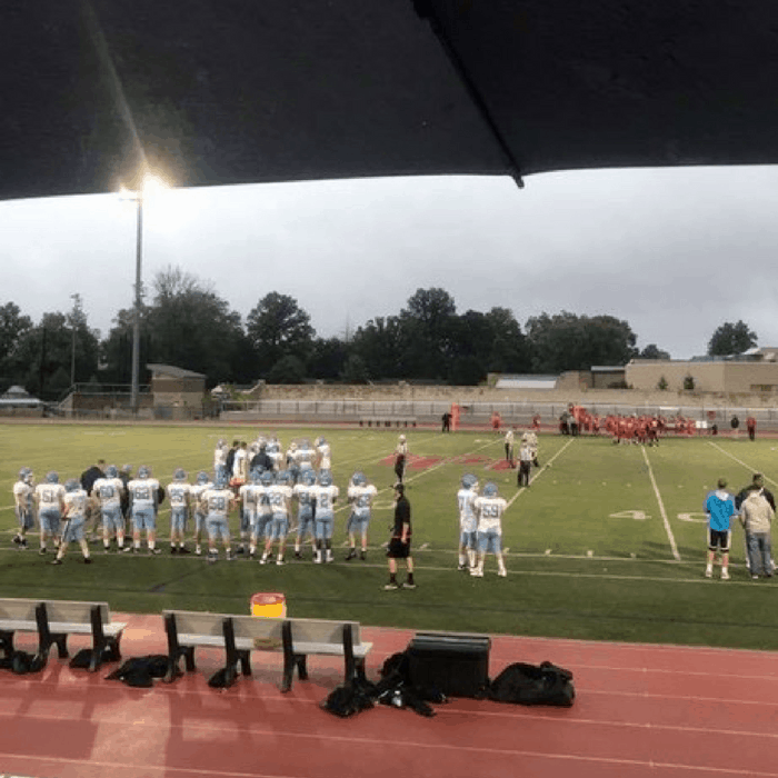 football game in the rain