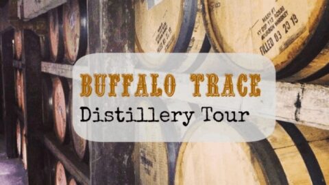 Rows of wooden bourbon barrels stacked in a warehouse at Buffalo Trace Distillery in Frankfort, Kentucky.