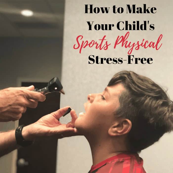 A medical professional examines a childs throat during a sports physical.