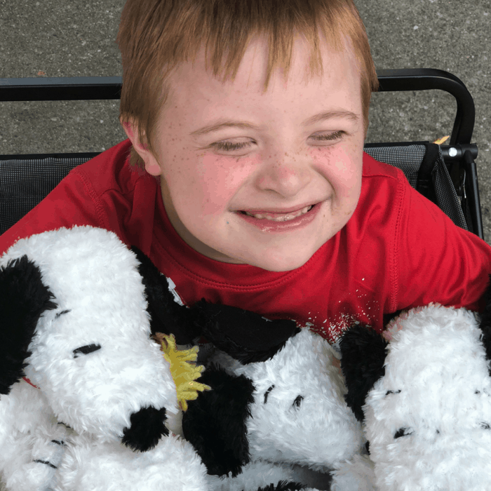 Micah Smiling with Snoopy