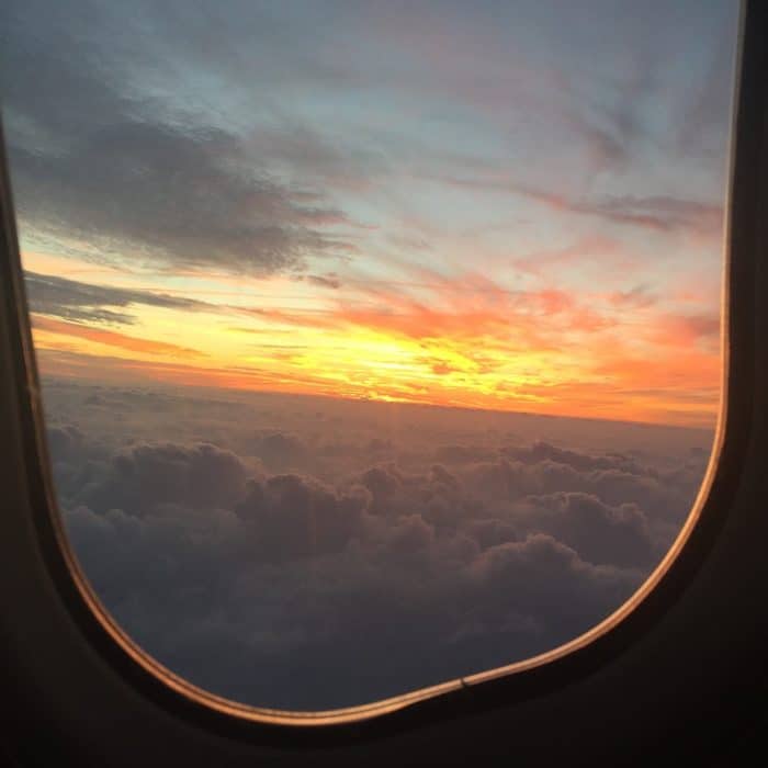 view of the sunset from airplane window