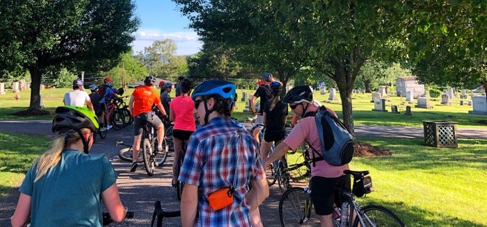 Community Bike Ride with Overmountain Cycles through a cemetery