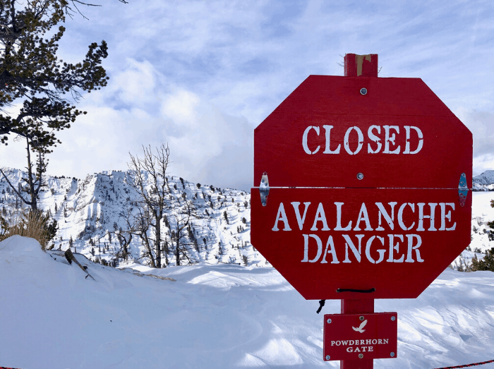 avalanche danger sign at Solitude Resort in Utah e1576990060108