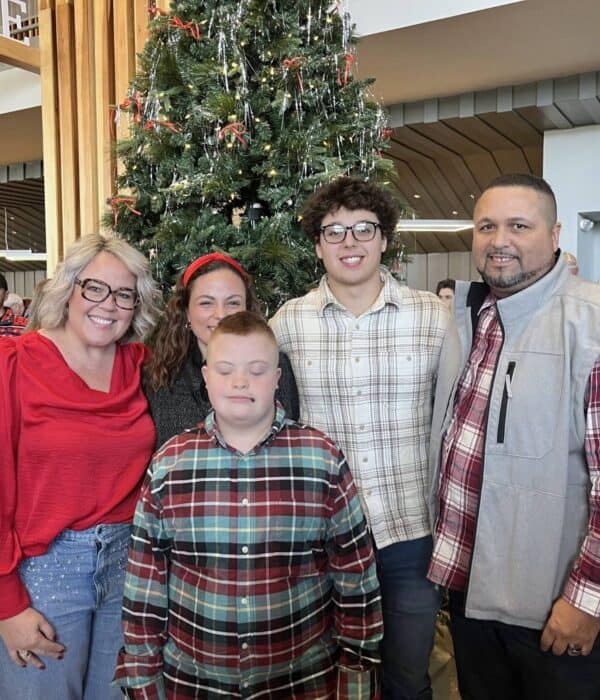 family picture by Christmas Tree