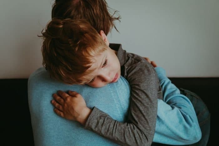 boy hugging his mom