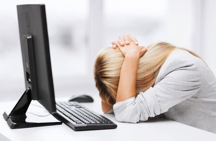 woman stressed out at computer
