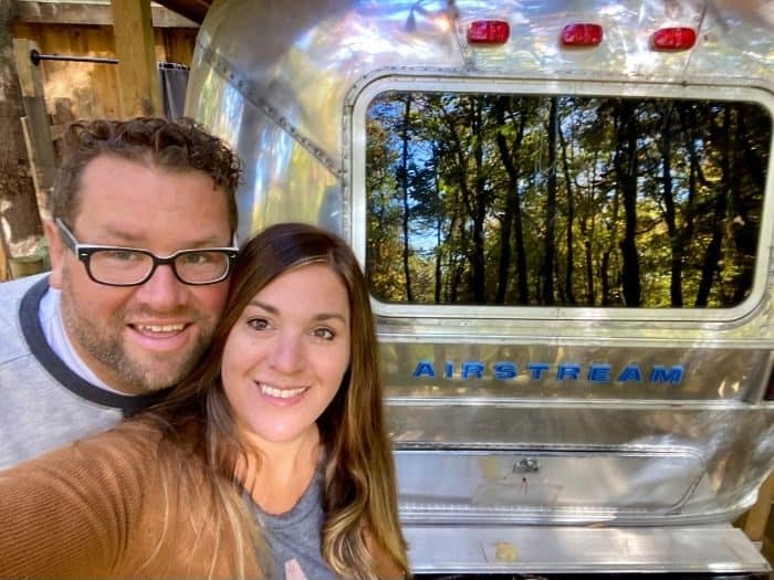 Nedra McDaniel and husband at the Silver Bullet Airstream treehouse