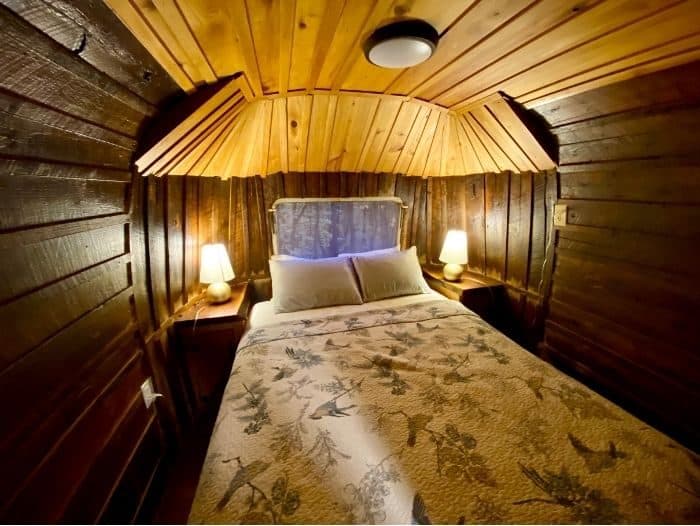 bedroom inside The Silver Bullet Airstream Treehouse at The Mohicans