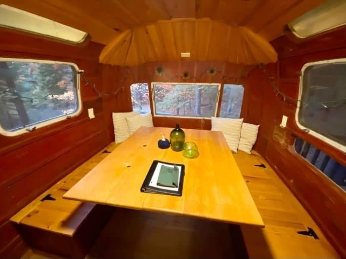 dining table inside the Airstream treehouse at The Mohicans