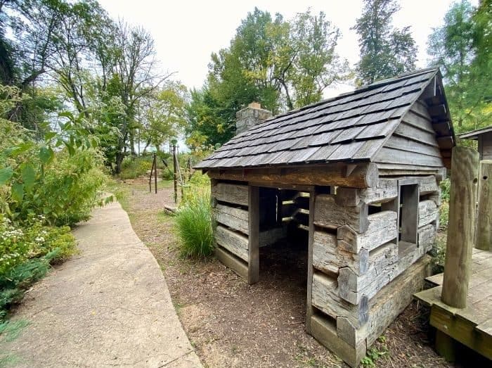 log cabin playlhouse at Nature play at the Behringer-Crawford Museum