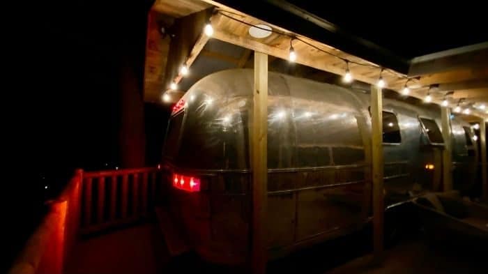 the Silver Bullet Airstream treehouse at night