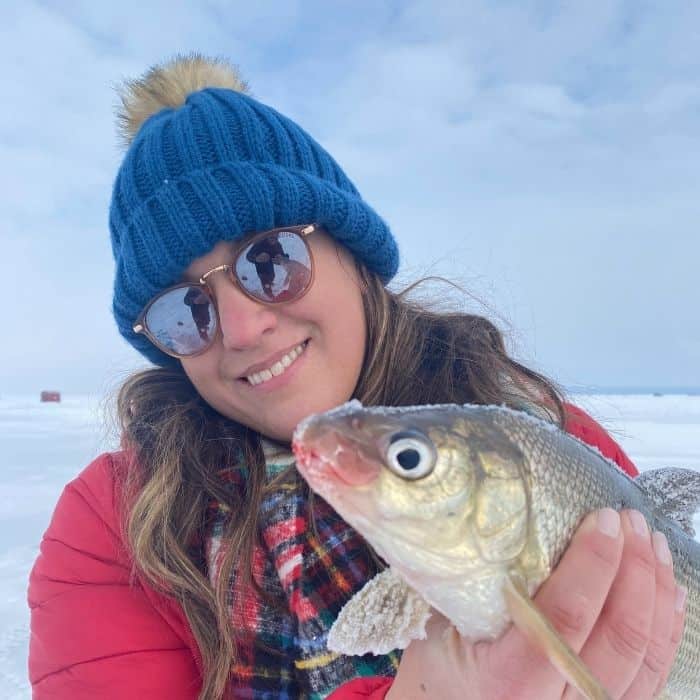 Nedra McDaniel with whitefish from ice fishing