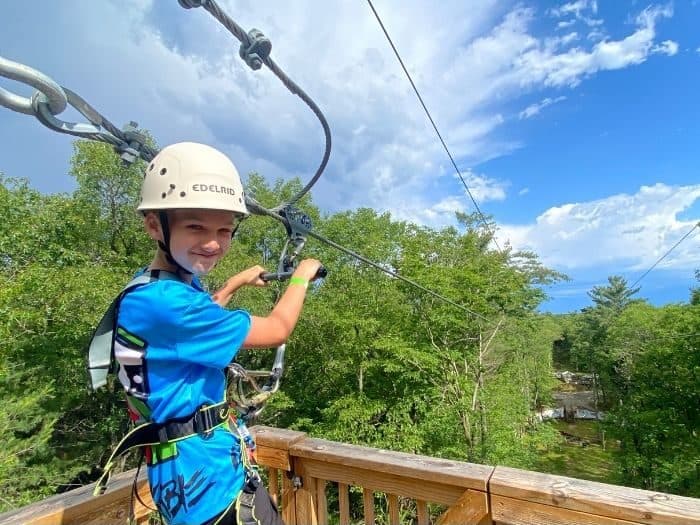 boy on zipline at Muskegon Luge Adventure Sports Park