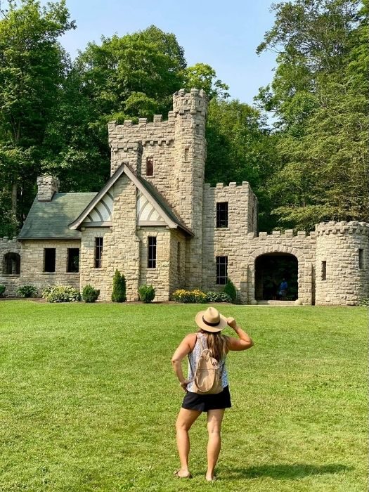 woman in front of Squire’s Castle in Ohio