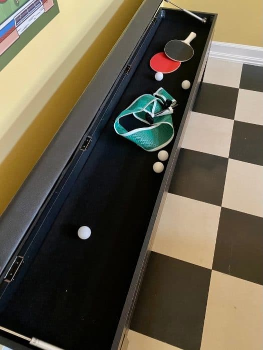 ping pong accessories in foyer at the Go Lodge game themed mansion