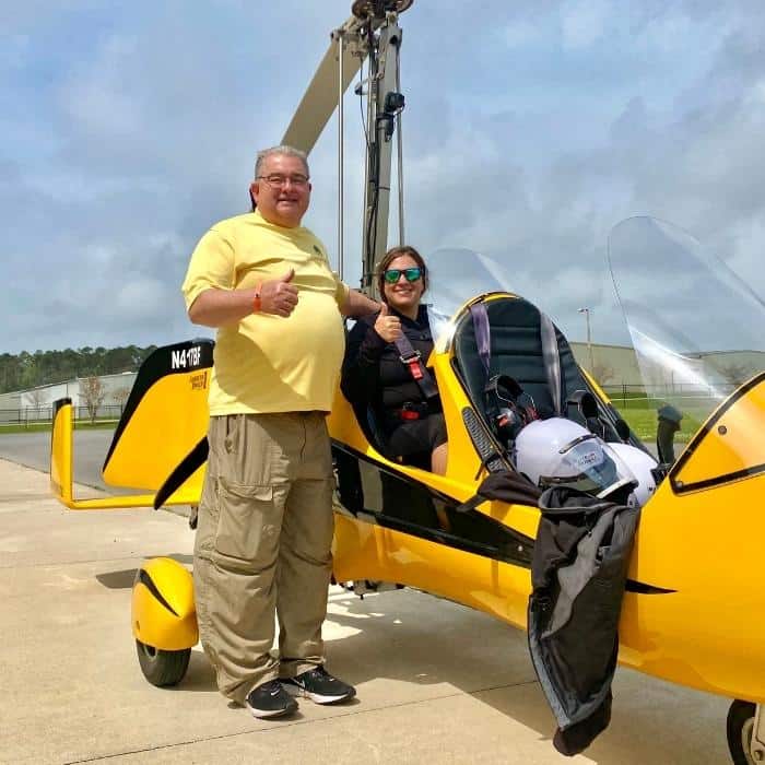 Nedra McDaniel and dad next to open tandem gyroplane with BeachFlight Aviation
