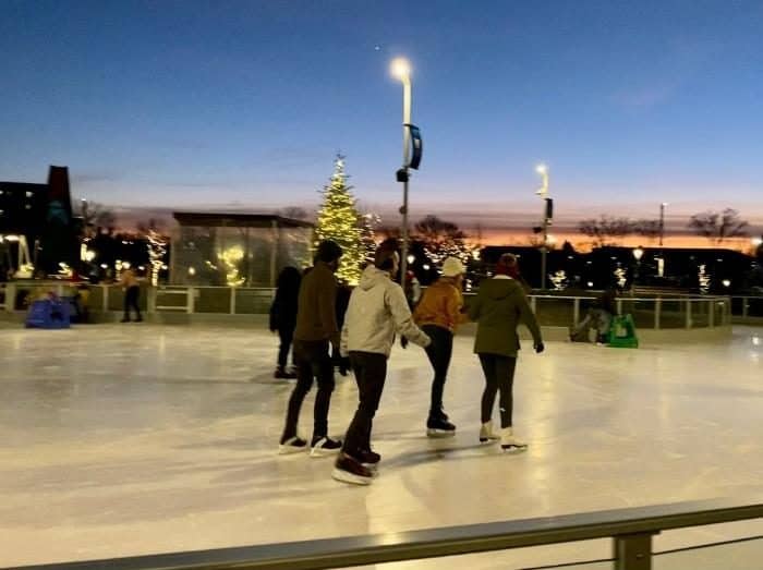group skating on the ice pond at Howard Park