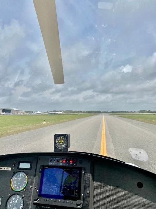 view of the runway from inside the gyroplane