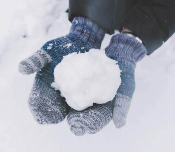 holding a snowball