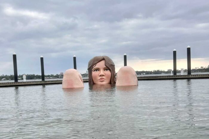 the Lady of the Lake Sculpture in the water at Barber Marina