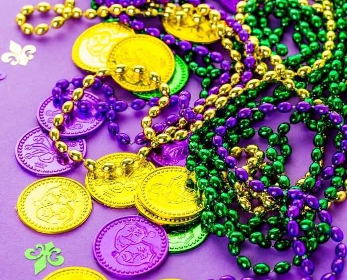 Mardi Gras beads and coins