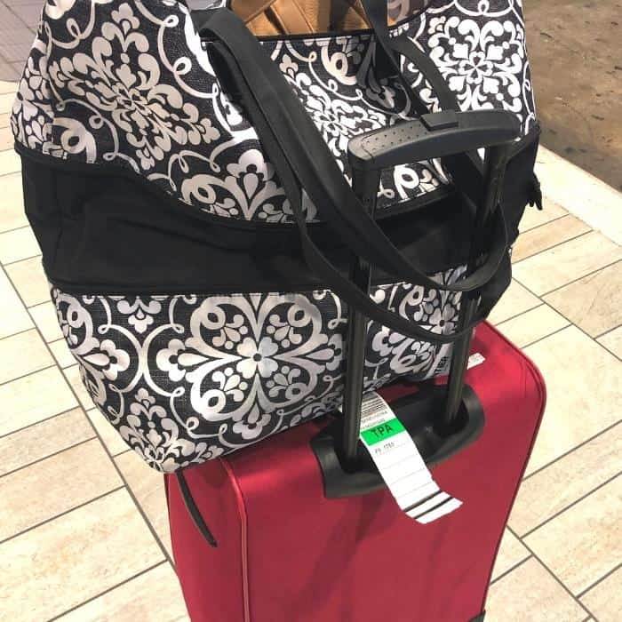 expandable bag with carry on suitcase
