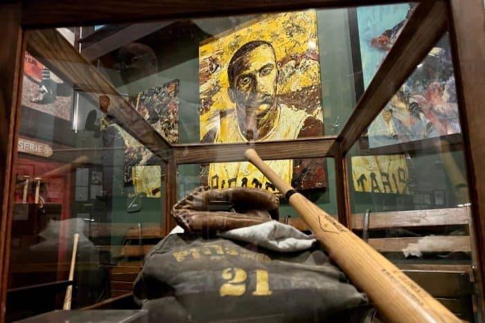 bat and glove on display at The Clemente Museum