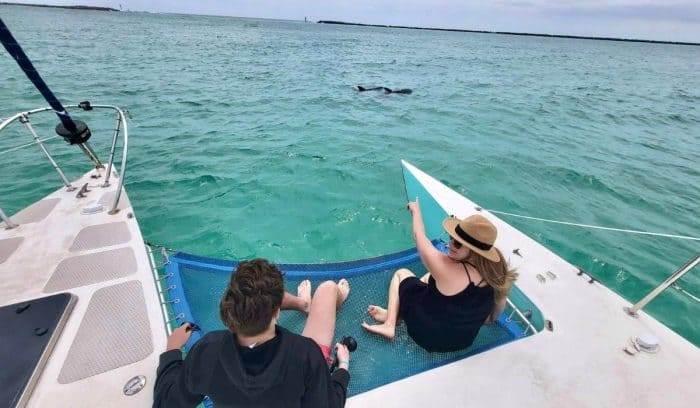 Adventure mom and son on dolphin sail in Destin FL