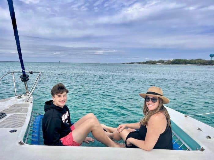 Adventure mom and son on sail boat in Destin