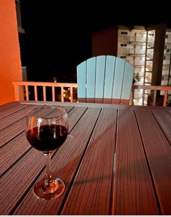 wine glass on balcony on Inlet Reef Club Destin Florida