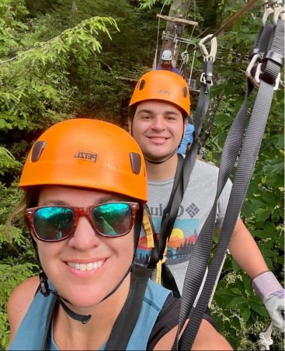 mother and son on treetop canopy tour