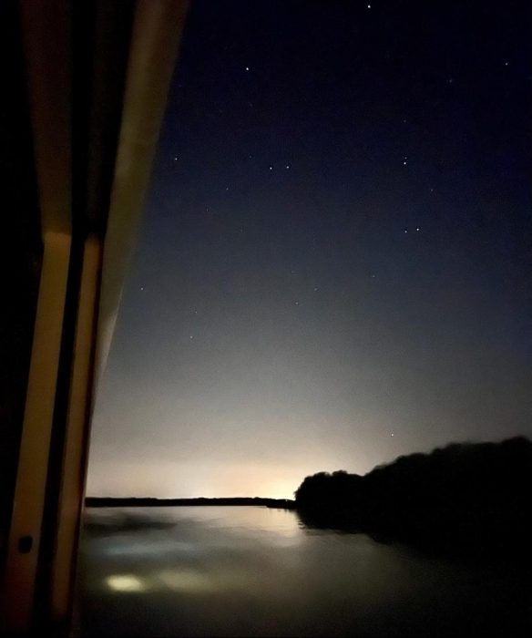 stars in sky over Danube River at night
