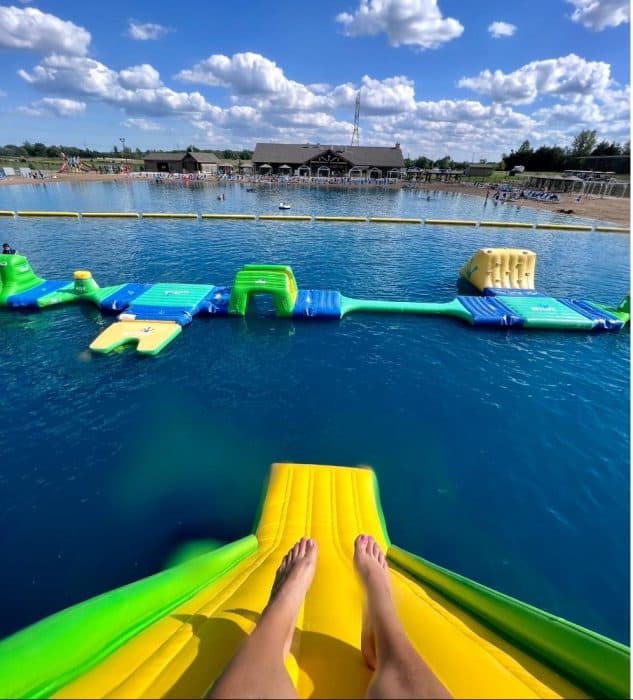 view from top of slide at Adventure Island Floating Water Obstacle Course