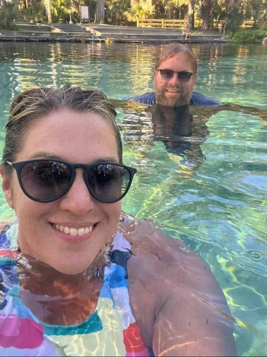 couple in the water at Juniper Springs Recreational Area in Florida