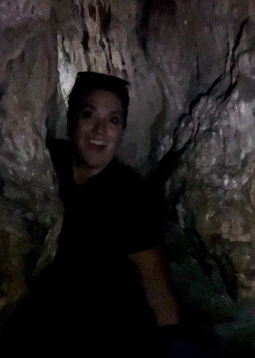 woman in McKimmie's Cave at Highlands Nature Sanctuary