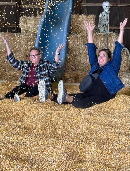 women in corn pit at Ballentine Corn Maze