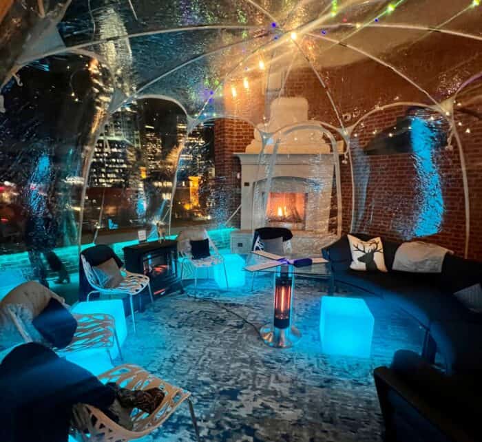 inside the snow globe at Vista at The Lytle Park hotel at night
