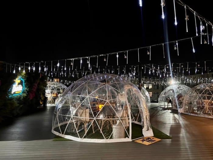 rooftop igloos at Braxton Brewing Company in Covington at night 2