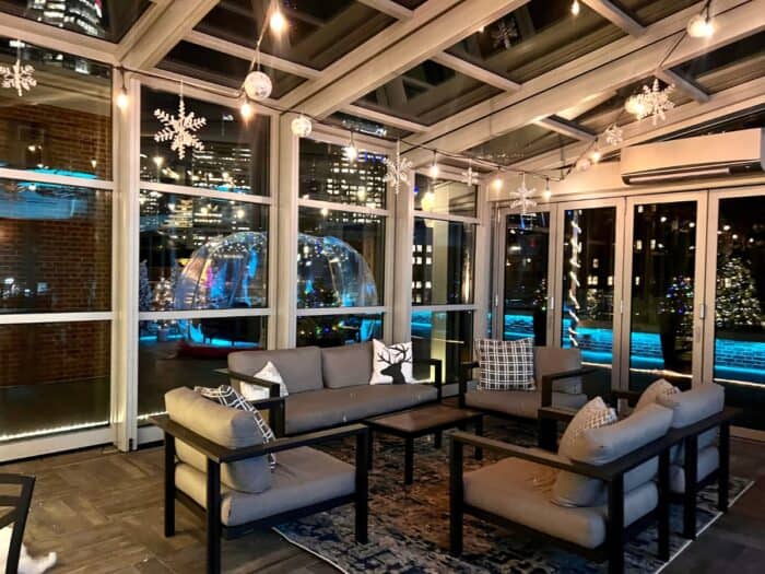 seating area at Vista at The Lytle Park hotel at night