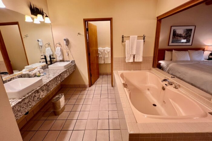 bathroom area for the Lakefront Spa Suite at the Pines Resort 