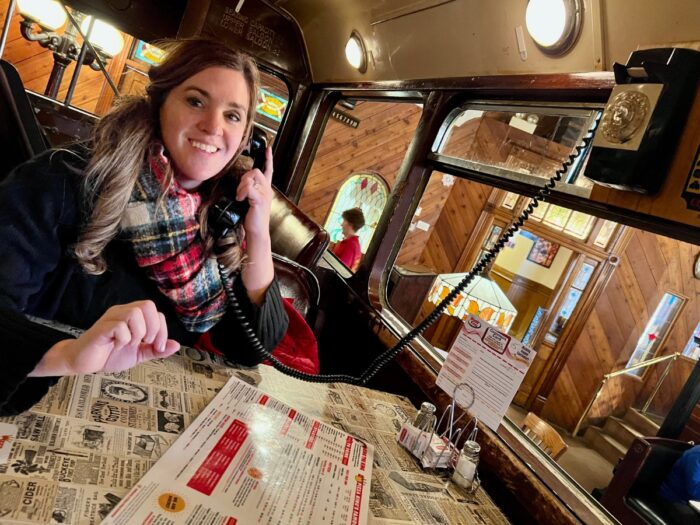 phone inside double decker bus at Clara's Pizza King