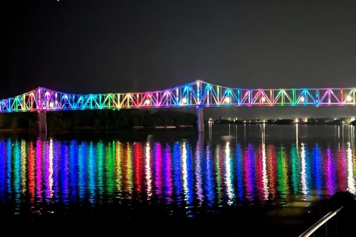 colorful lights on The Owensboro Bridge at night