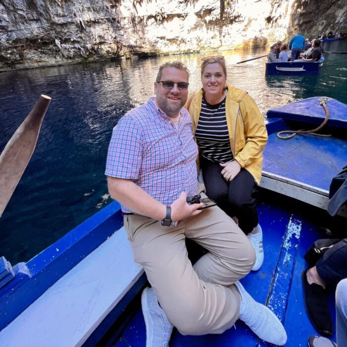 couple on row boat in Greece