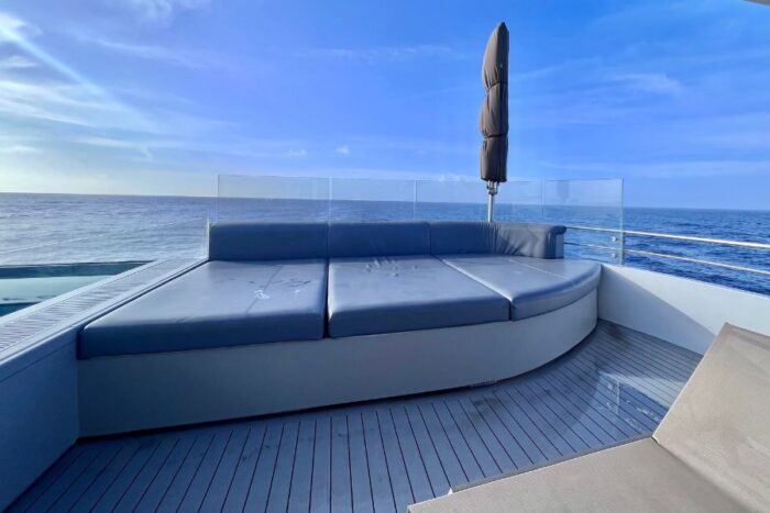 lounge area by pool on Emerald Azzurra luxury yacht