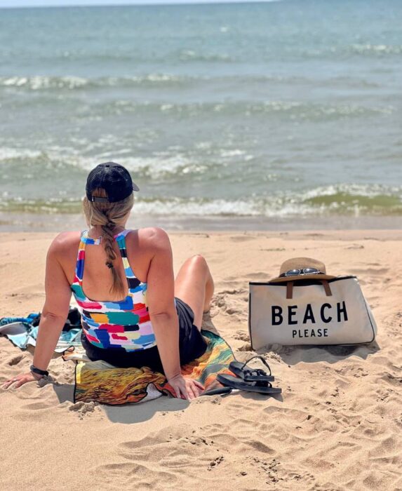 woman at the beach in Ludington Michigan 