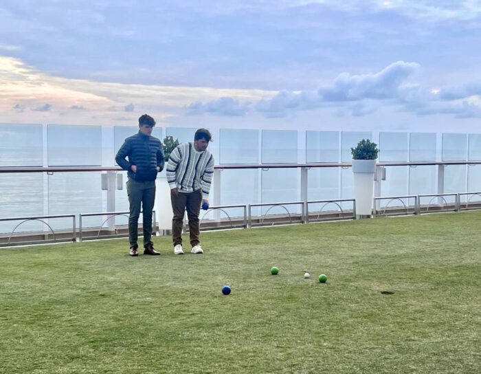 teenagers playing bocce ball on Celebrity Eclipse
