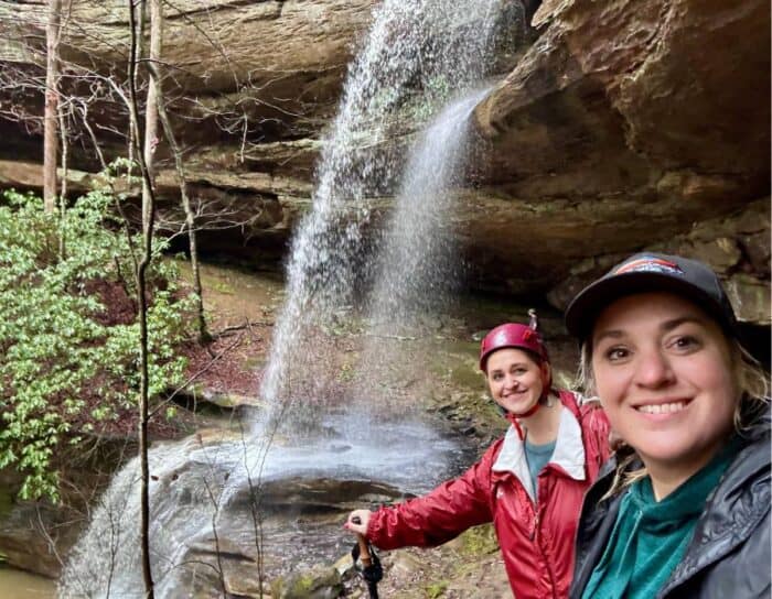 women near water fall at Red River Gorge